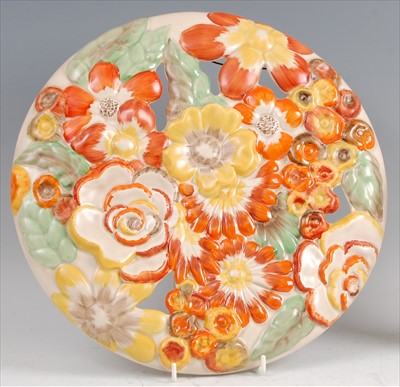 Lot 37 - A 1930s Clarice Cliff pottery circular wall...