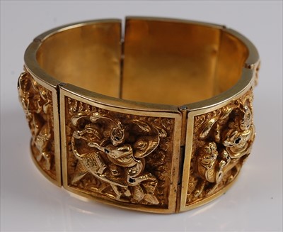 Lot 1213 - A yellow metal Asian style panel bangle,...