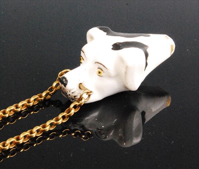 Lot 1249 - A late Georgian Staffordshire pottery dogs...