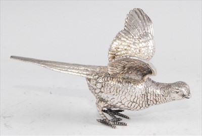 Lot 1143 - An Elizabeth II silver grouse table ornament,...