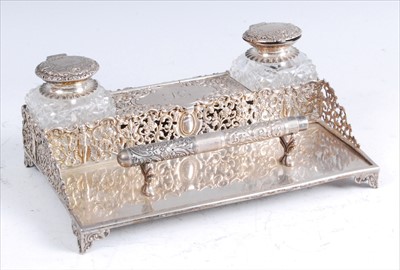 Lot 1146 - A late Victorian silver inkstand, having a...