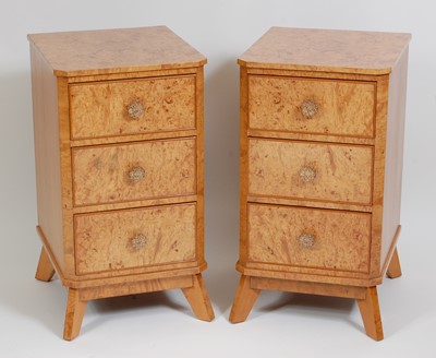 Lot 1231 - A pair of Art Deco burr walnut three-drawer...