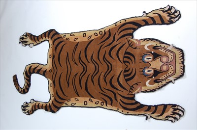 Lot 331 - A contemporary Liberty & Co Tibetan Tiger rug,...