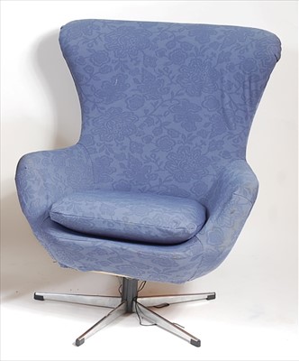 Lot 395 - A 1960s floral upholstered and fibreglass...