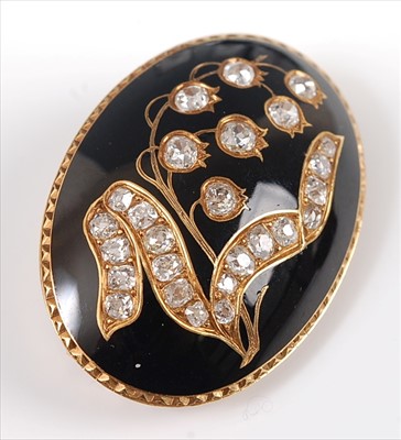 Lot 1199 - A Victorian yellow metal, diamond and black...