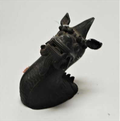 Lot 24 - A Chinese bronze ornament in the form of a...