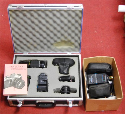 Lot 72 - A Pentax ME series camera, in fitted case with...