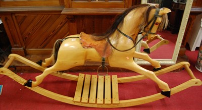 Lot 1113 - A contemporary carved sycamore and elm rocking...