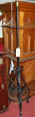 Lot 1115 - An early 20th century black painted wrought...