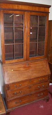 Lot 1156 - A 19th century mahogany bureau bookcase,...