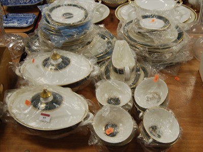 Lot 85 - A Royal Doulton eight place setting dinner...