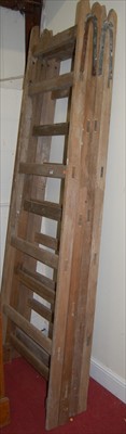 Lot 1160 - A pair of large pine A-frame ladders, each of...