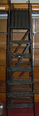 Lot 1161 - A black painted A-frame decorators ladder,...