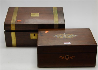 Lot 88 - A Victorian walnut and brass bound writing...
