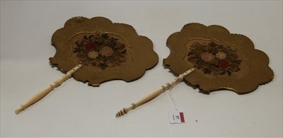 Lot 97 - A pair of Regency hand screens, each having a...