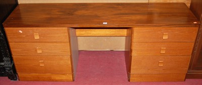Lot 1184 - A G-Plan teak kneehole long dressing table,...