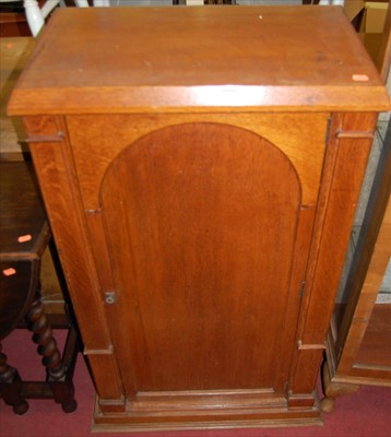 Lot 1189 - A Victorian oak single arched door side...