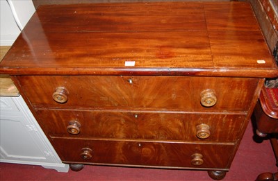 Lot 1196 - A Victorian mahogany chest of three long...