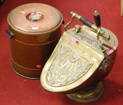 Lot 114 - A Victorian brass helmet shaped coal bin...