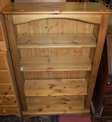Lot 1201 - A modern pine round cornered freestanding open...