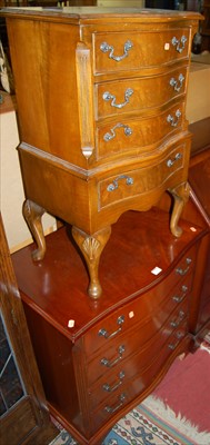 Lot 1206 - A reproduction mahogany serpentine front chest...