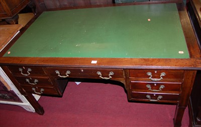 Lot 1212 - A circa 1900 mahogany kneehole writing desk,...