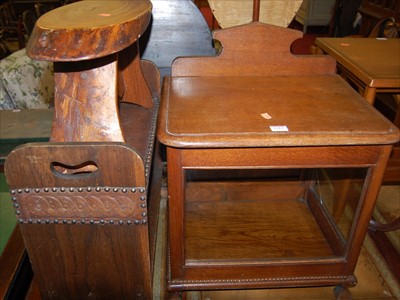 Lot 1213 - An early 20th century oak round cornered...