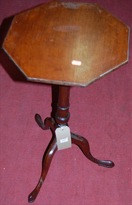 Lot 1214 - A 19th century mahogany octagonal tilt-topped...