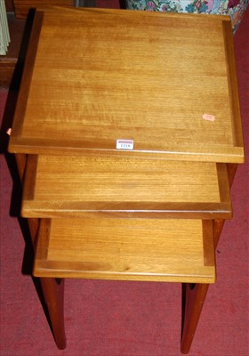 Lot 1218 - A 1970s G-Plan teak nest of three occasional...