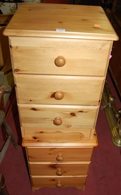 Lot 1227 - A pair of modern pine and laminate three...