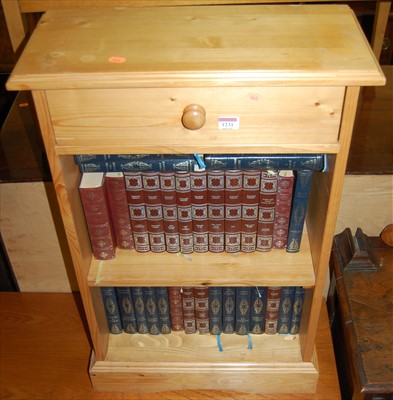 Lot 1231 - A modern pine low freestanding open bookshelf,...