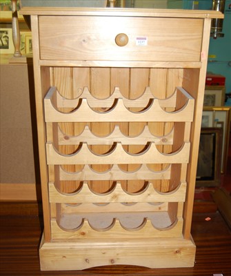 Lot 1237 - A modern pine low freestanding open wine rack,...