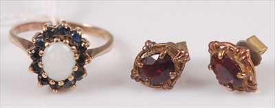 Lot 333 - A ladies 9ct gold opal and blue sapphire set...
