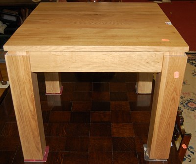 Lot 1240 - A contemporary light oak square low occasional...