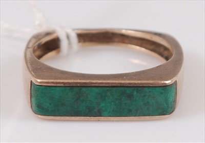Lot 334 - A modern 9ct gold and malachite set dress ring,...
