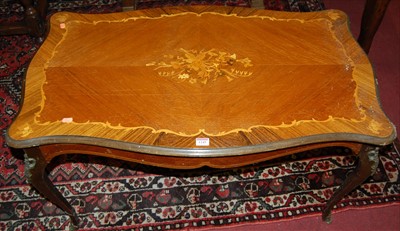 Lot 1245 - A French satinwood inlaid shaped top low...
