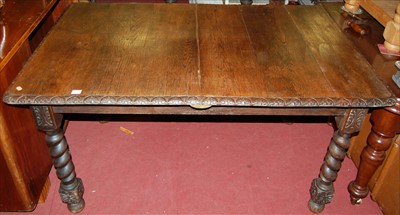 Lot 1261 - An early 20th century relief carved oak round...
