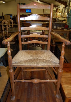 Lot 1265 - A 19th century provincial elm ladderback and...