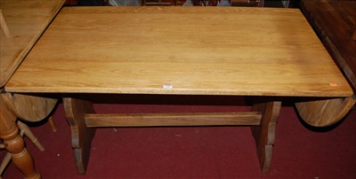 Lot 1268 - An elm dropflap trestle end dining table, max...