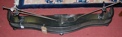 Lot 1282 - A 19th century steel serpentine pierced fender,...
