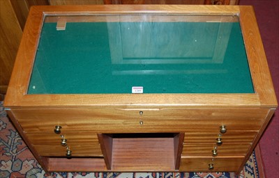 Lot 1289 - A contemporary hardwood hinged glazed top low...