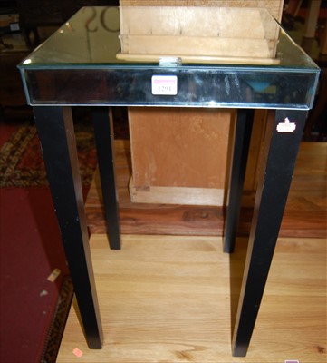Lot 1291 - A contemporary square mirror topped occasional...