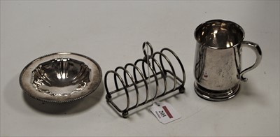 Lot 205 - A George V silver bell-shaped tankard, having...