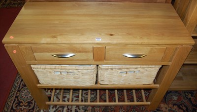 Lot 1292 - A contemporary light oak two drawer side table,...