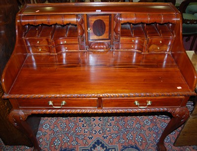 Lot 1296 - A contemporary American hardwood desk, having...