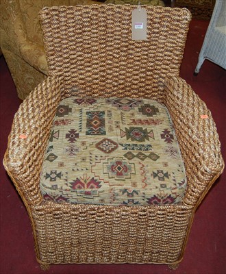 Lot 1303 - A contemporary heavy woven wicker single...