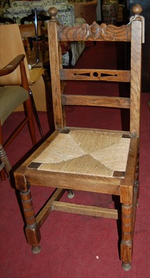 Lot 1305 - A set of four early 20th century oak...
