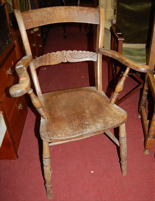 Lot 1310 - An early 20th century elm and beech bar back...