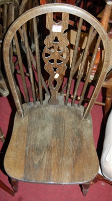 Lot 1316 - A set of four contemporary beech wheel back...