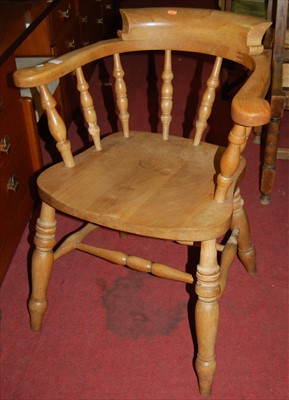 Lot 1318 - A pair of beech turned stick back captain's...